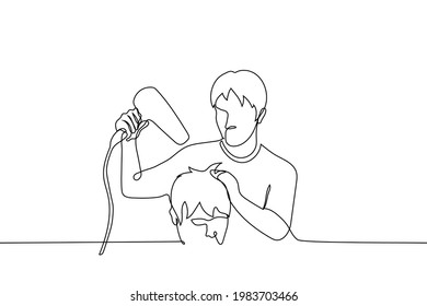 male barber dries hair with a hairdryer to a male client - one line drawing. barber styling the hair of the visitor