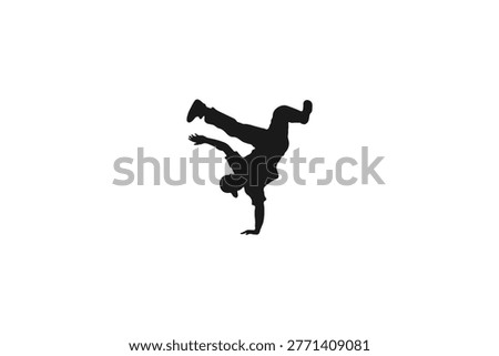 Male breakdancer performing a handstand freeze move silhouette