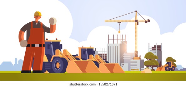 male builder in hard hat waving hand workman standing near heavy tractor excavator industrial worker in uniform building concept construction site background flat full length horizontal vector