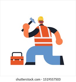 male builder using hammer and toolbox busy workman industrial construction carpenter worker in uniform building concept rear view flat full length