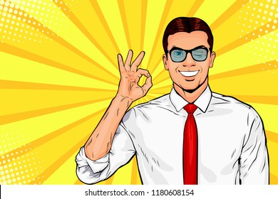 Male businessman in glasses winks and shows okay or OK gesture. Pop art retro vector illustration. Success concept. Invitation poster.