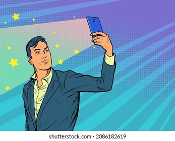 Male businessman selfie video. The light from the screen illuminates the face. Taking photos or online streaming