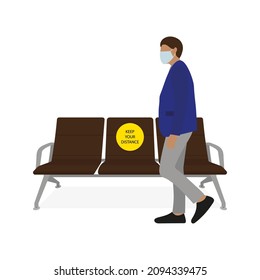 A Male Character In Business Attire And A Medical Mask Stands Near The Seats With A 