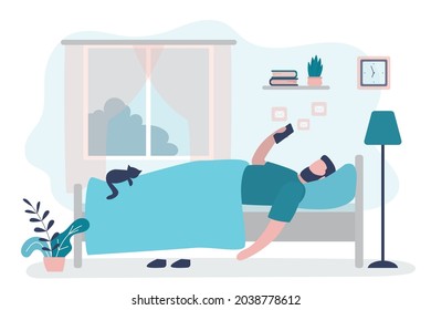 Male character lying in bed with phone. Man after waking up checks messages. Bedroom interior design. Guy communicates on social networks. Beginning of new day. Modern lifestyle. Vector illustration