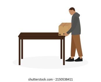 Male character puts a cardboard box on the table on a white background