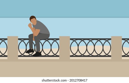 Male character sitting on the fence on the embankment