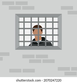 Male character in the window behind bars