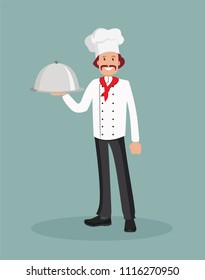 A male chef with a cooked dish.
