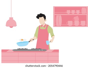 A male chef making an omelete in the kitchen.