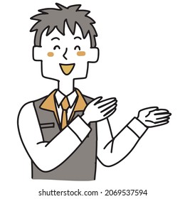 Male clerk at a consumer electronics retail store pointing diagonally upwards