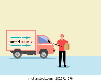 Male delivery driver holding parcels in preparation for delivery with delivery truck and white background