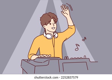 Male DJ waving to greet club goers and cheer up dancing people. Guy with headphones around neck stands behind mixing console while controlling music at party. Flat vector illustration