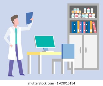 Male doctor examining x-ray picture standing at his office near desk with computer. Medical consulting room interior. Radiology and healthcare vector