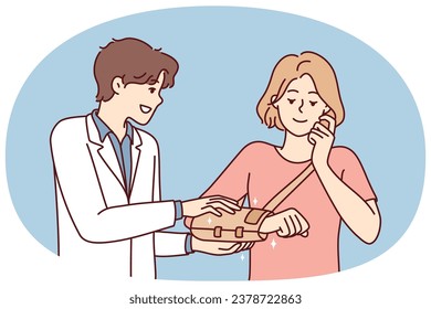 Male doctor help patient put bandage on hand after trauma or injury. Therapist or surgeon cure woman with broken shoulder in hospital. Vector illustration.