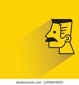 male face with shadow on yellow background