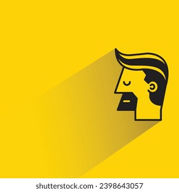 male face with shadow on yellow background