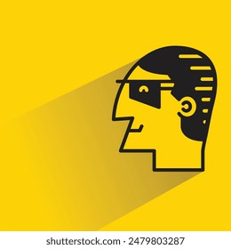 male face sideview icon with drop shadow on yellow background