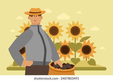 Male farmer gathering sunflower seeds at farm