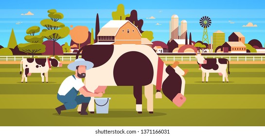 male farmer milking cow in bucket farm domestic animal cattle fresh milk concept flat horizontal farmland barn countryside landscape flat full length horizontal