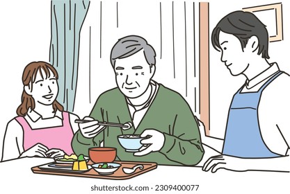 Male and female caregivers and elderly men who assist with meals
