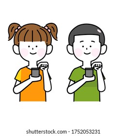 Male and female children happily playing with smartphones