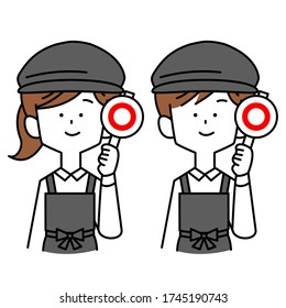 Male and female clerk with correct answer plate