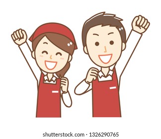 Male and female clerk wearing an apron.They are pushing up the fist.