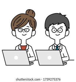 Médicos hombres y mujeres que utilizan una computadora