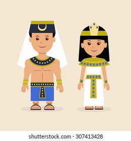 Male and female in the Egyptian attire. Characters of Pharaoh and the Cleopatra.