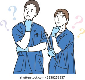 Male and female medical workers in thought