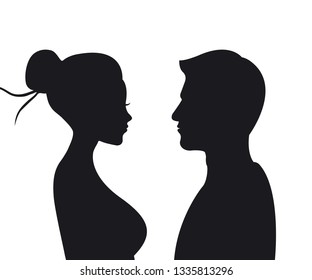 Male and female silhouettes opposite each other, isolated vector.