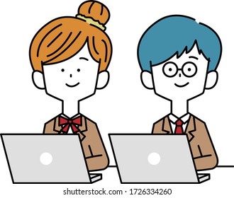 Male and female students using a computer