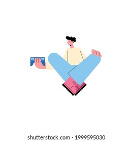 male gamer seated with control character
