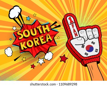 Male hand in the country flag glove of a sports fan raised up celebrating win and South Korea speech bubble with stars and clouds. Vector colorful illustration in retro comic style colored background