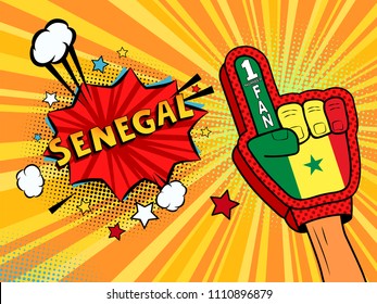 Male hand in the country flag glove of a sports fan raised up celebrating win and Senegal speech bubble with stars and clouds. Vector colorful illustration in retro comic style on colored background