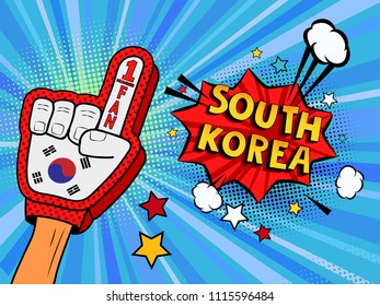Male hand in the country flag glove of a sports fan raised up celebrating win and South Korea speech bubble stars and clouds. Colorful illustration in retro comic style  on blue cartoon background