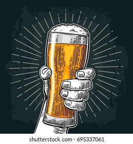 Male hand holding a beer glass. Vintage color vector engraving illustration for web, poster, invitation to party or festival. Isolated on dark background