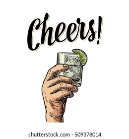 Male hand holding a glass with gin, lemon and ice cubes. Cheers toast lettering. Vintage vector color engraving illustration for label, poster, invitation to a party. Isolated on white background.