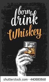 Male hand holding a glass with whiskey and ice cubes. Vintage vector engraving illustration for label, poster, invitation to party and birthday.