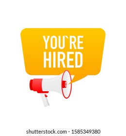 Male hand holding megaphone with you're hired speech bubble. Loudspeaker.