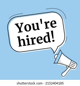 Male hand holding megaphone with you're hired speech bubble. Loudspeaker.