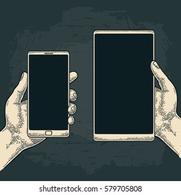 Male hand holding a modern mobile phone. Vintage drawn black vector engraving illustration for info graphic, poster, web. Isolated on black background