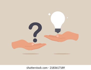 Male hand holding question mark with other reply with light bulb. Question and answer, solving problem.