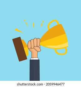 Male hand holding winner's Gold Trophy Cup.
Winner trophy awards. Trophy cup flat icon.  Success and business goals concept.