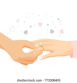 Male hand puts diamond ring on female finger