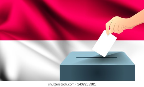 Male hand puts down a white sheet of paper with a mark as a symbol of a ballot paper against the background of the Indonesia flag, Indonesia the symbol of elections