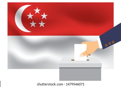 Male hand puts down a white sheet of paper with a mark as a symbol of a ballot paper against the background of the Singapore flag. Singapore the symbol of elections.