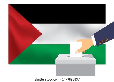 Male hand puts down a white sheet of paper with a mark as a symbol of a ballot paper against the background of the Gaza Strip flag. Gaza Strip the symbol of elections.
