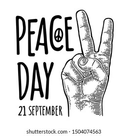 Male hand showing two fingers. Peace Day lettering. Vector black vintage engraving illustration isolated on white background. For web, poster