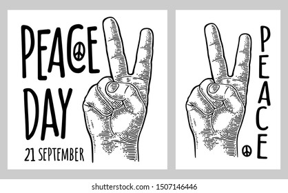 Male hand showing two fingers. Peace Day lettering. Vector black vintage engraved illustration isolated on white background. For web, poster